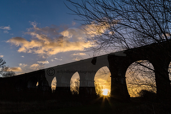 sunrise over sankey railway viaduct